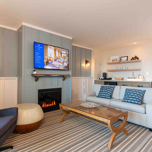 Sunrise Suite fireplace with a cozy couch