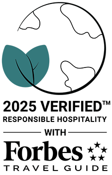 2025 Verified Responsible Hospitality with Forbes Travel Guide Text with globe and leaf logo